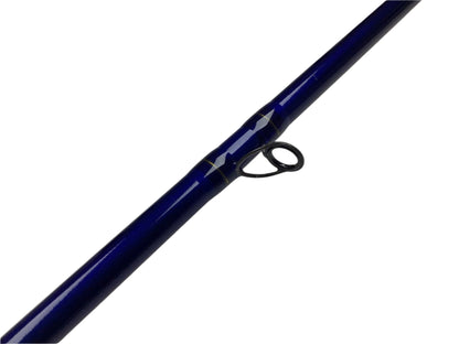 A close-up of the St. Croix Legend Tournament Musky Casting Rod Split Cork 8'0" Heavy Switch Blade—used, mint condition—shows its black guide ring. Trade it in for store credit with our Rod and Reel Trade-In Program. White background.