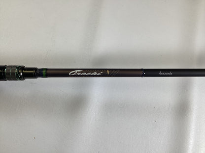 A close-up of a Megabass Orochi X10 F9-710XT Anaconda 7'10" XXH used casting rod in excellent condition—ideal for anglers or those trading in gear for store credit.