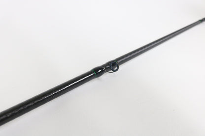 A close-up of a Shimano Curado CDC610LBFSGA 6'10" Light casting rod in excellent used condition highlights a line guide—perfect for those seeking quality used fishing gear or store credit with our rod and reel trade-in program.