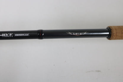 Close-up of a black Daiwa Steez AGS spinning rod with cork handle, featuring "ZEEZ" and "NANOPLUS" near the grip. Ideal for our Trade-In Program, where used gear can be exchanged for store credit. The background is a simple white surface.