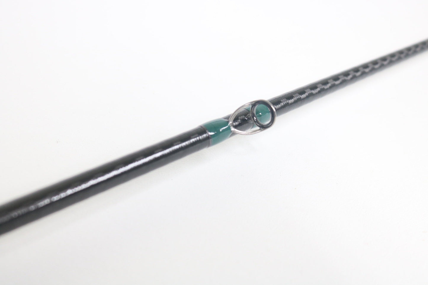 A close-up of the G. Loomis Conquest CNQ 843C MBR Used Casting Rod in mint condition highlights its quality—perfect for showcasing premium pre-owned G. Loomis gear available through our Rod and Reel Trade-In Program for store credit.