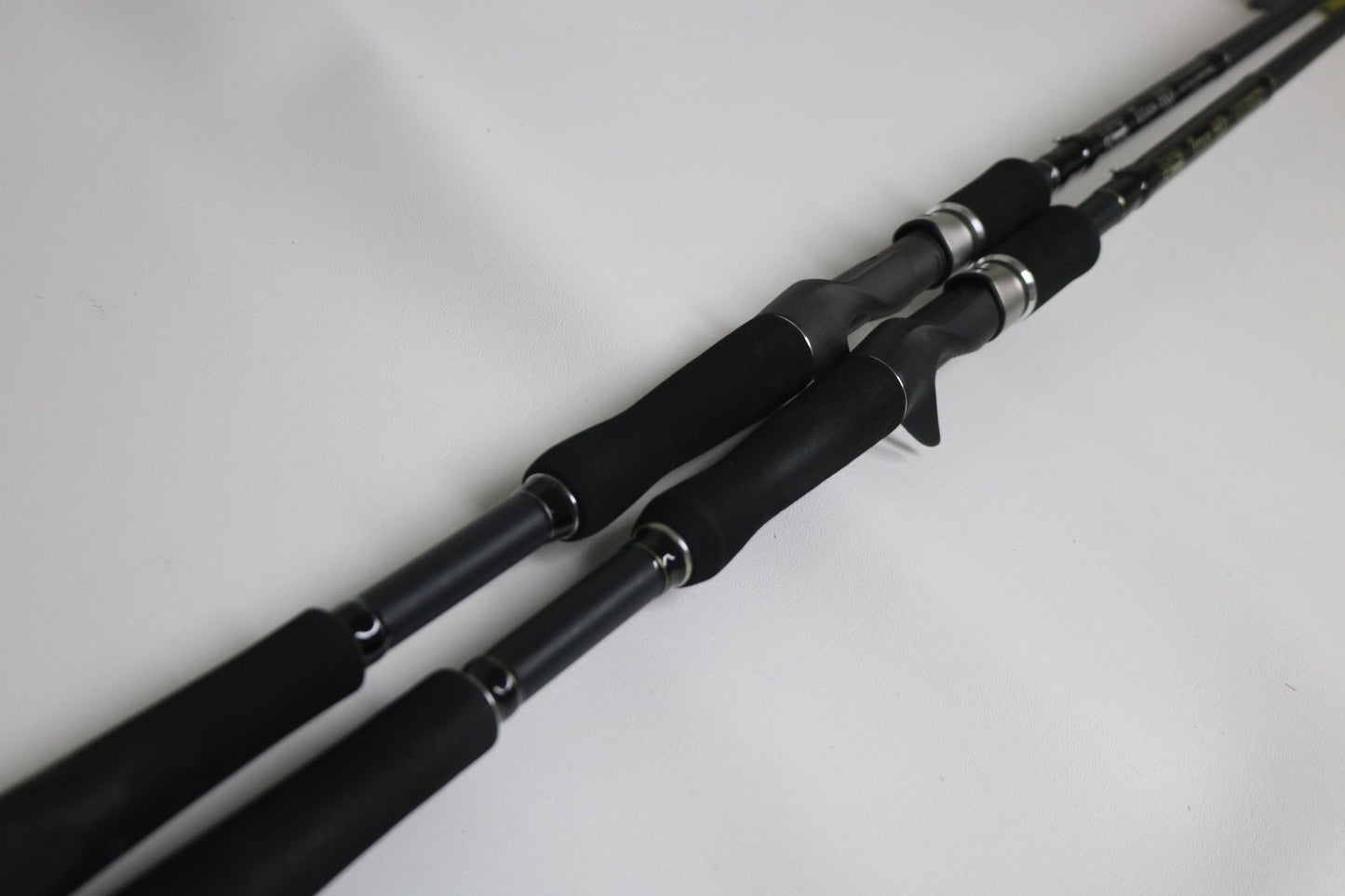 Two Fitzgerald Titan HD THD76H and THD76XH Casting Rods (Used, Very Good Condition) by Fitzgerald, shown side by side—ideal for those exploring our Rod and Reel Trade-In program for store credit.