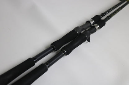 Two Fitzgerald Titan HD THD76H and THD76XH Casting Rods (Used, Very Good Condition) by Fitzgerald, shown side by side—ideal for those exploring our Rod and Reel Trade-In program for store credit.