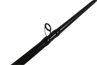 Close-up of a Shimano Poison Adrena PAD1611MA 6'11" Medium+ casting rod section in excellent condition. Features a single black guide ring with thread wrappings, perfect for our Rod and Reel Trade-In Program. The glossy black finish stands out against a plain light gray background.