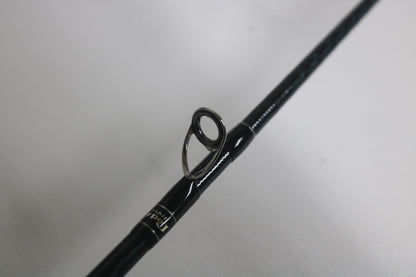 Close-up of a Shimano Game Type J 6'0" used casting rod in excellent condition, highlighting its metal line guide against a white background—ideal for the Rod and Reel Trade-In Program.