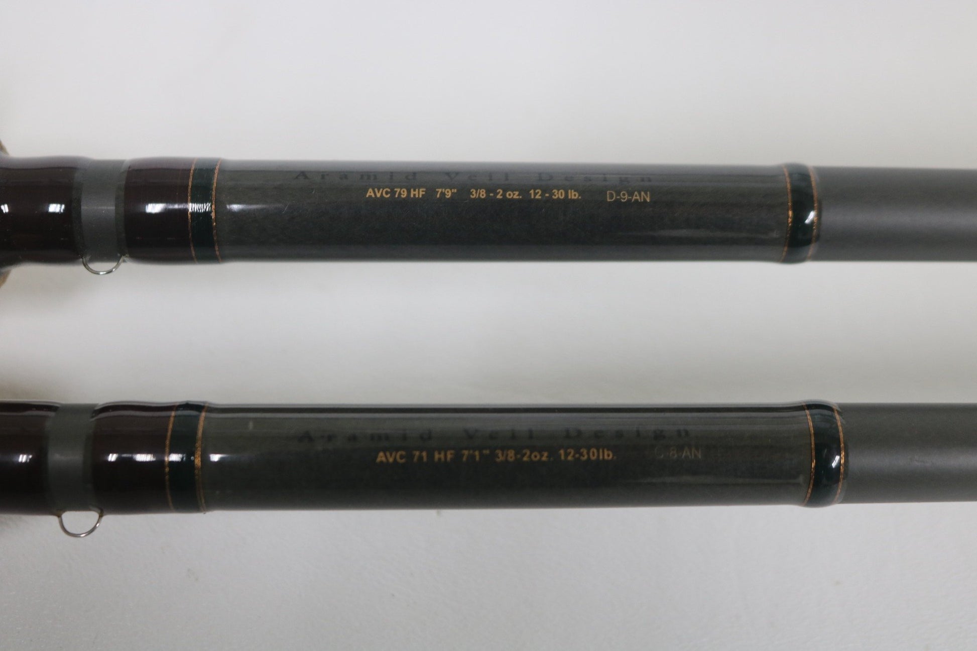 Two Fenwick Techna Av Used Casting Rods—AVC79HF (7’9”, 3/8-2oz.) and AVC71HF (7’1”) in very good condition with dark finishes and gold accents. Trade-in your gear for store credit on your next Fenwick upgrade!.