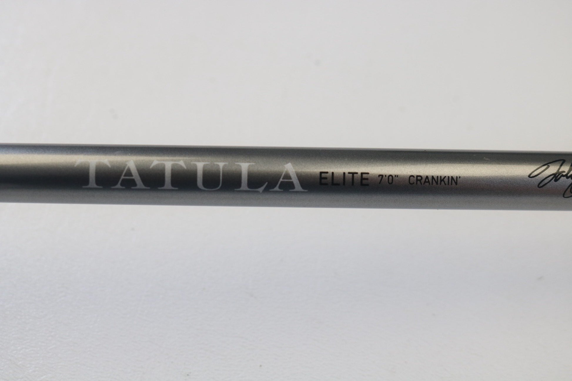 Close-up of a Daiwa Tatula Elite TAEL701MHRB-G 7'0" Medium Heavy Glass Used Casting Rod in excellent condition—great for those interested in our rod and reel trade-in program or searching for quality used gear.