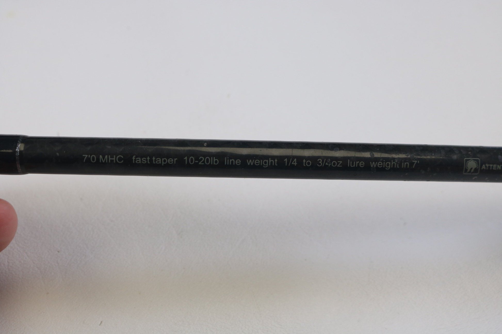 A close-up of the Waft Iron Feather 7'0" Medium Heavy Used Casting Rod shows its specs, ideal for those evaluating gear condition or trading in with a Rod and Reel Trade-In. Brand: Waft. Condition: Good.
