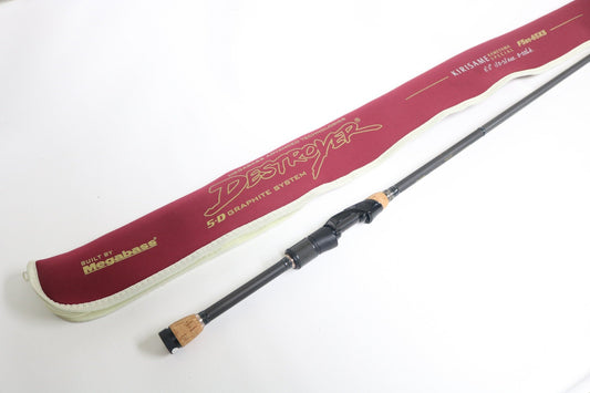 The Megabass Destroyer P5 F5st-65XS Kirisame Kameyama Special, a used spinning rod in excellent condition, sits next to its maroon and white "Destroyer 5-D Graphite System" case—perfect for the Rod and Reel Trade-In Program.