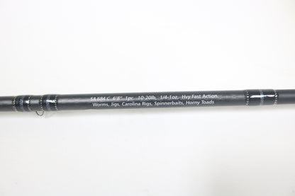 A close-up of the Dobyns Sierra SA684C Used Casting Rod in excellent condition, black with white specs: 6'8", 10-20lb, 1/4-1oz, heavy fast action—ideal for worms, jigs, Carolina rigs, spinnerbaits, and horny toads.