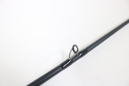 Close-up of a Dobyns Sierra SA684C Used Casting Rod in excellent condition, highlighting a single metal line guide against a plain white background.