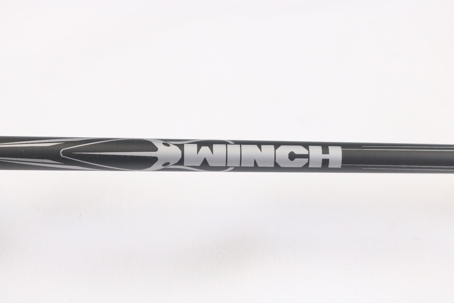 A close-up of the Abu Garcia Winch WINCHS72-4 7'2" Medium Light Used Spinning Rod in excellent condition, featuring silver patterns and "WINCH" in bold letters—a great choice for our Rod and Reel Trade-In or those seeking quality used gear.