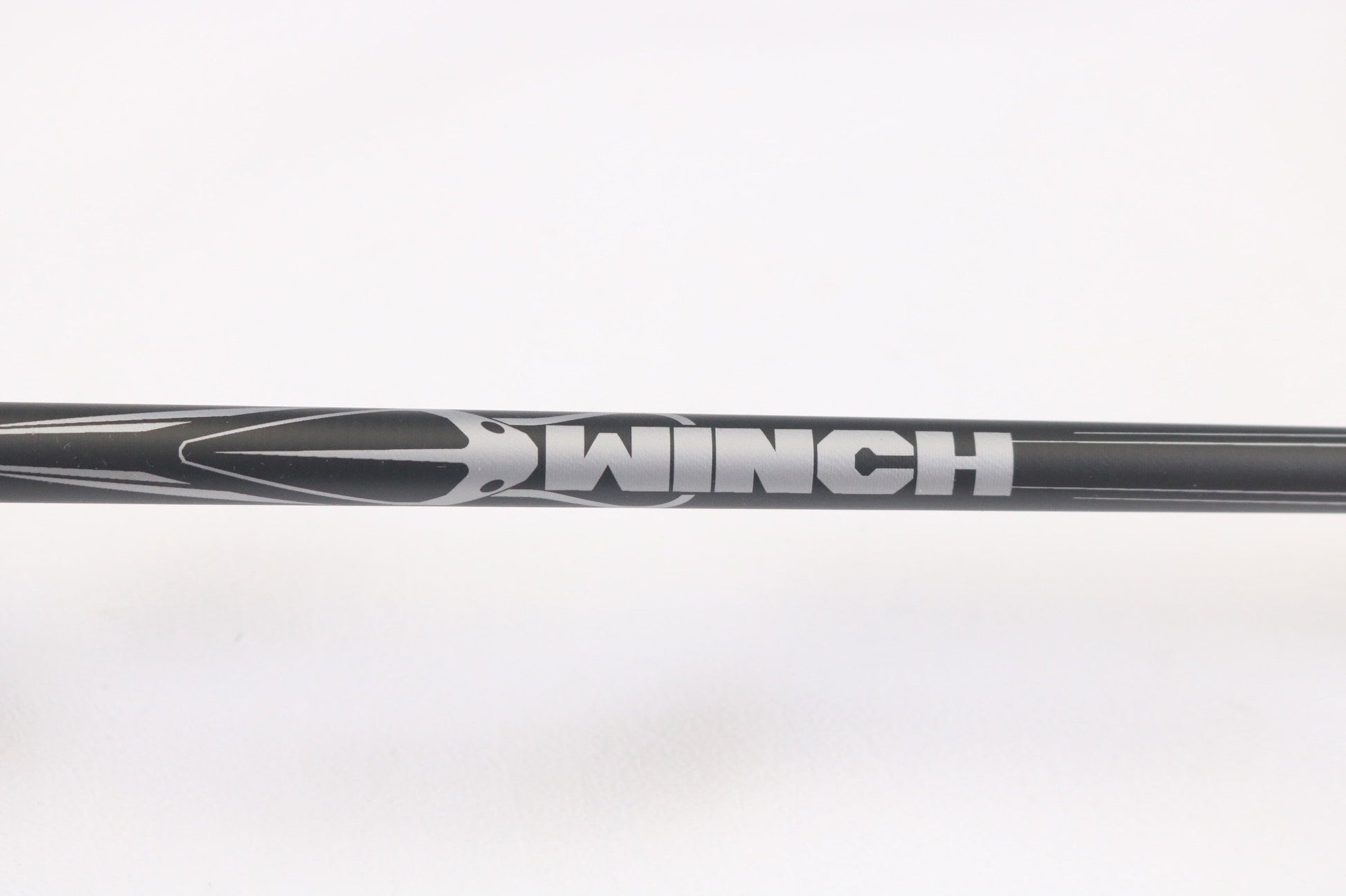 A close-up of the Abu Garcia Winch WINCHS72-4 7'2" Medium Light Used Spinning Rod in excellent condition, featuring silver patterns and "WINCH" in bold letters—a great choice for our Rod and Reel Trade-In or those seeking quality used gear.