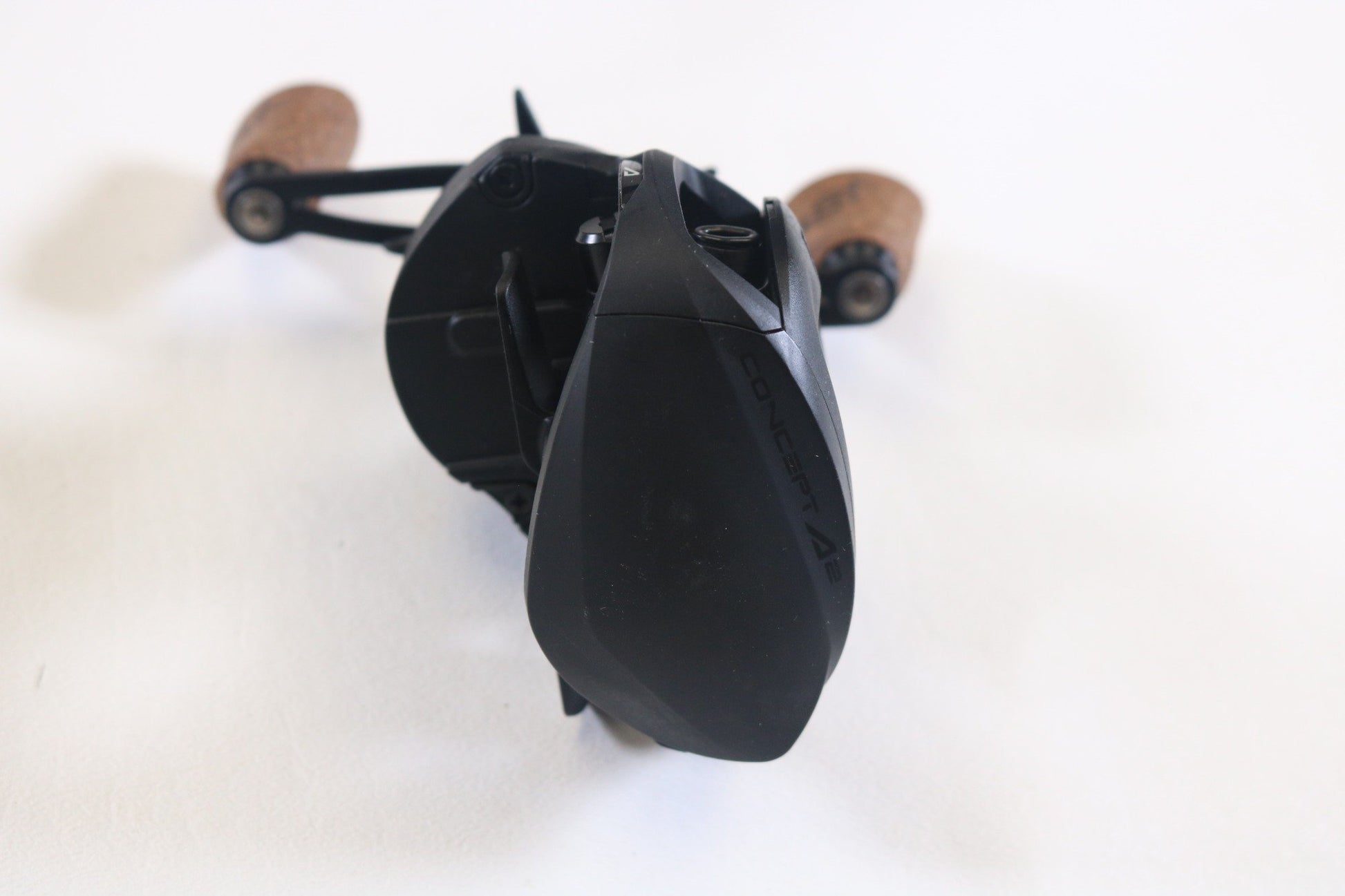 A 13 Fishing Concept A2 A2-7.5-RH 7.5:1 RH used casting reel in excellent condition is displayed on a white surface—ideal for those looking to earn store credit with our Rod and Reel Trade-In Program.