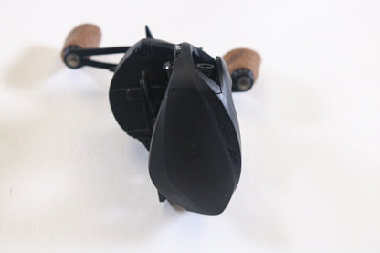 A 13 Fishing Concept A2 A2-7.5-RH 7.5:1 RH used casting reel in excellent condition is displayed on a white surface—ideal for those looking to earn store credit with our Rod and Reel Trade-In Program.