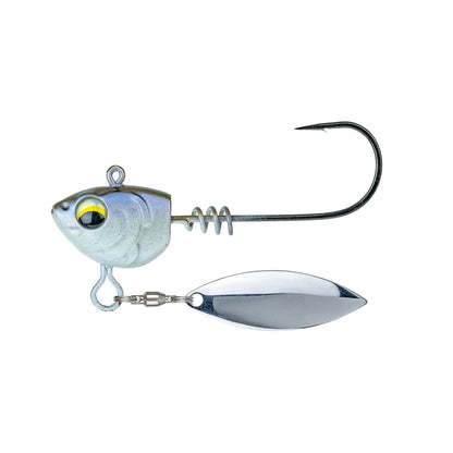 The 6th Sense Divine Underspin by 6th Sense is a silver fish-head-shaped lure with a yellow eye, large curved hook, screwlock keeper, and shiny metal spinner blade beneath, shown on a white background.