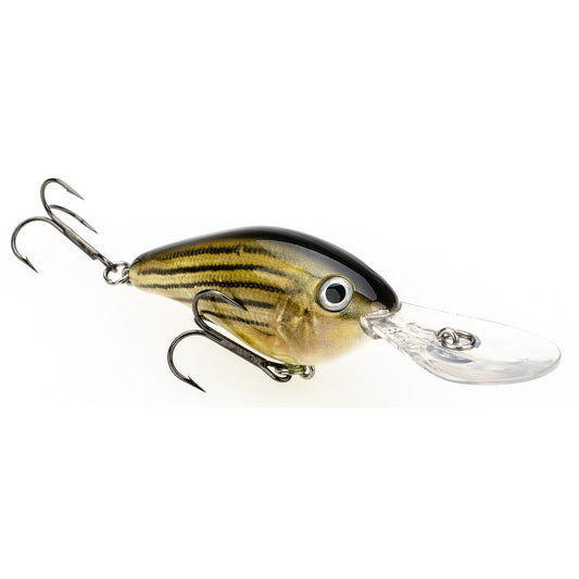 The Strike King 8XD Crankbait, from Strike King, features a fish-like shape with a black back, yellow-brown striped sides, two treble hooks, and a clear plastic lip—ideal for bass anglers seeking deep-diving action.