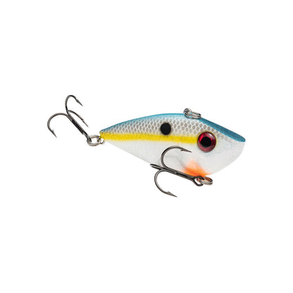 The Strike King Red Eye Shad by Strike King is a lipless crankbait shaped like a small fish, featuring a white body, yellow stripe, blue top, red eye, orange marking, and two premium hooks on the bottom and back.