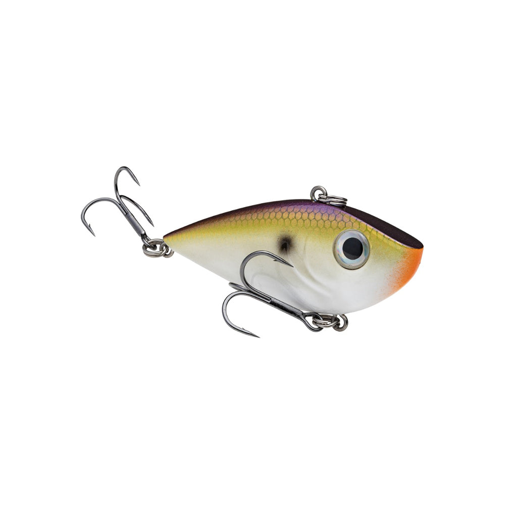 The Strike King Red Eye Shad by Strike King is a realistic, fish-shaped lipless crankbait featuring a white belly, yellow and purple gradient top, orange accents near the mouth, and two premium hooks on the bottom and tail.
