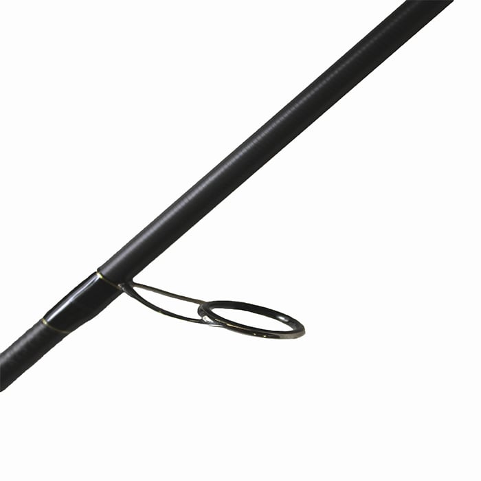 The Dobyns Xtasy 7'5" Medium Heavy Spinning Rod (DRX 754SF), with its sleek matte black finish, is shown diagonally on a plain white background, highlighting a guide eyelet in close-up.